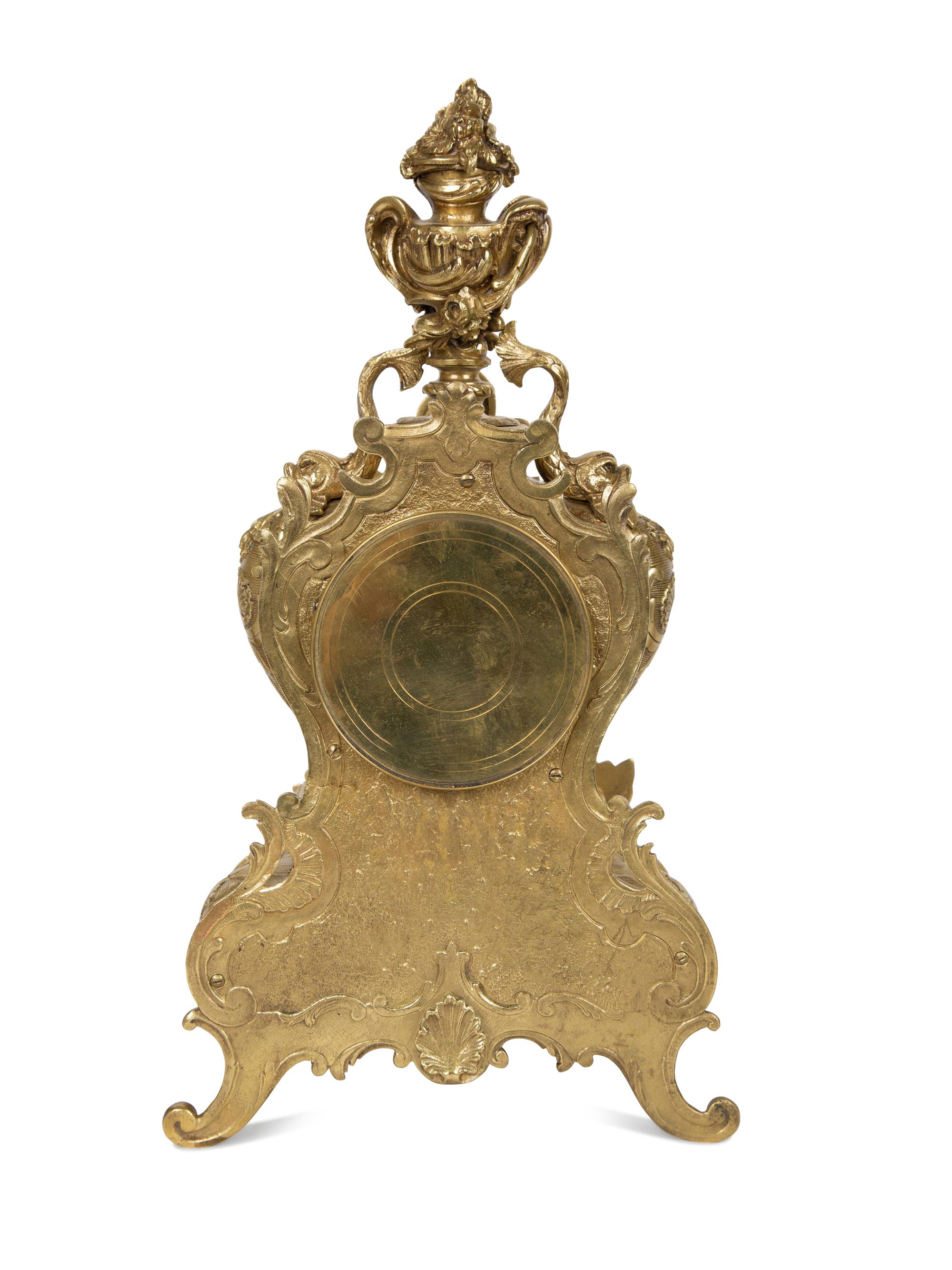 A Louis XV Style Gilt Metal Clock Garniture — LATE 19TH/EARLY 20TH CENTURY