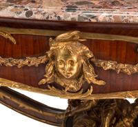 A Louis XV Style Gilt Bronze Mounted Mahogany Marble-Top Salon Table