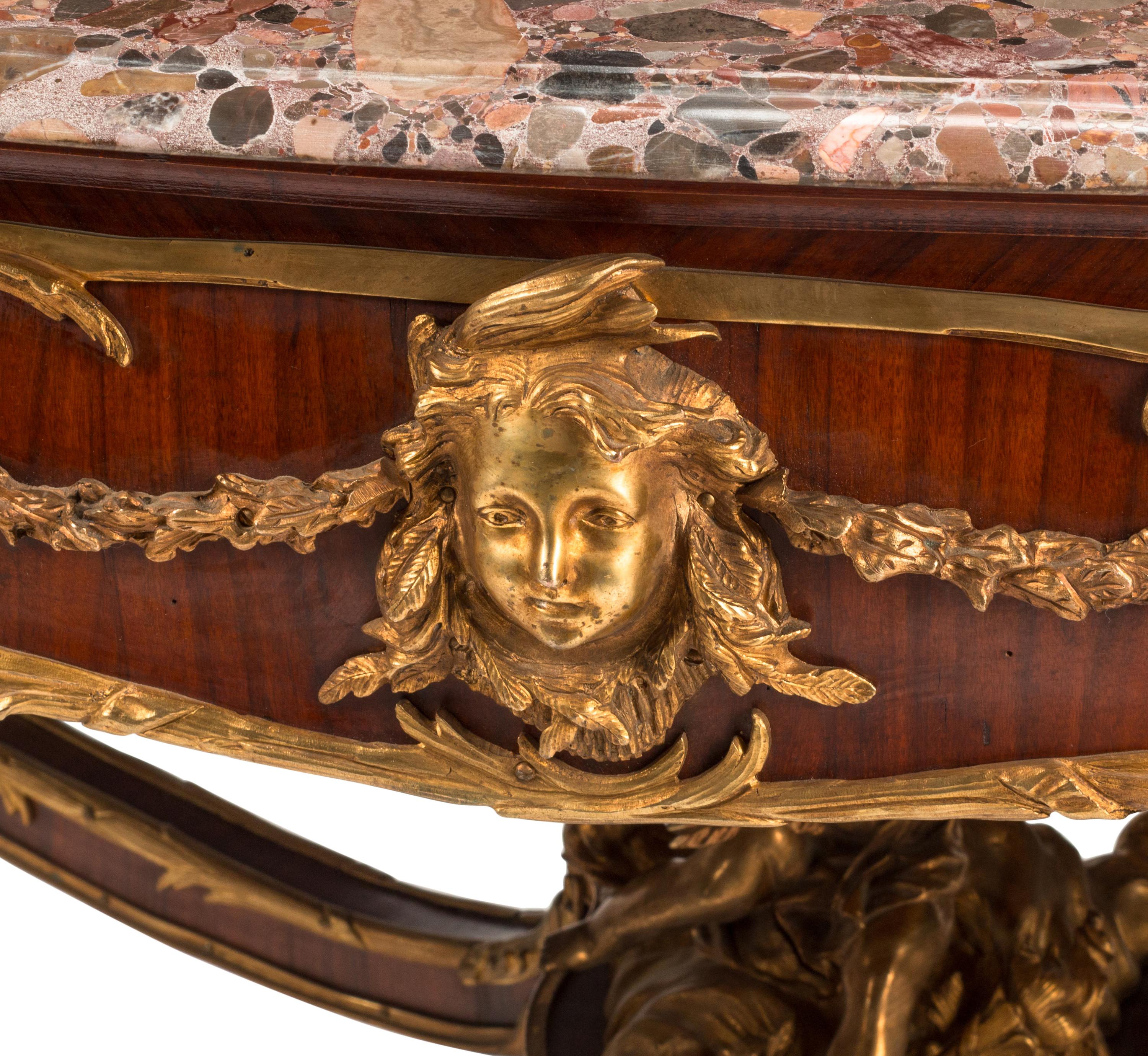 A Louis XV Style Gilt Bronze Mounted Mahogany Marble-Top Salon Table