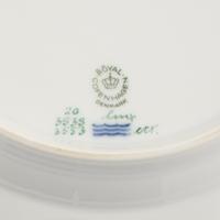 A Set of Nine Royal Copenhagen Flora Danica Porcelain Dinner Plates