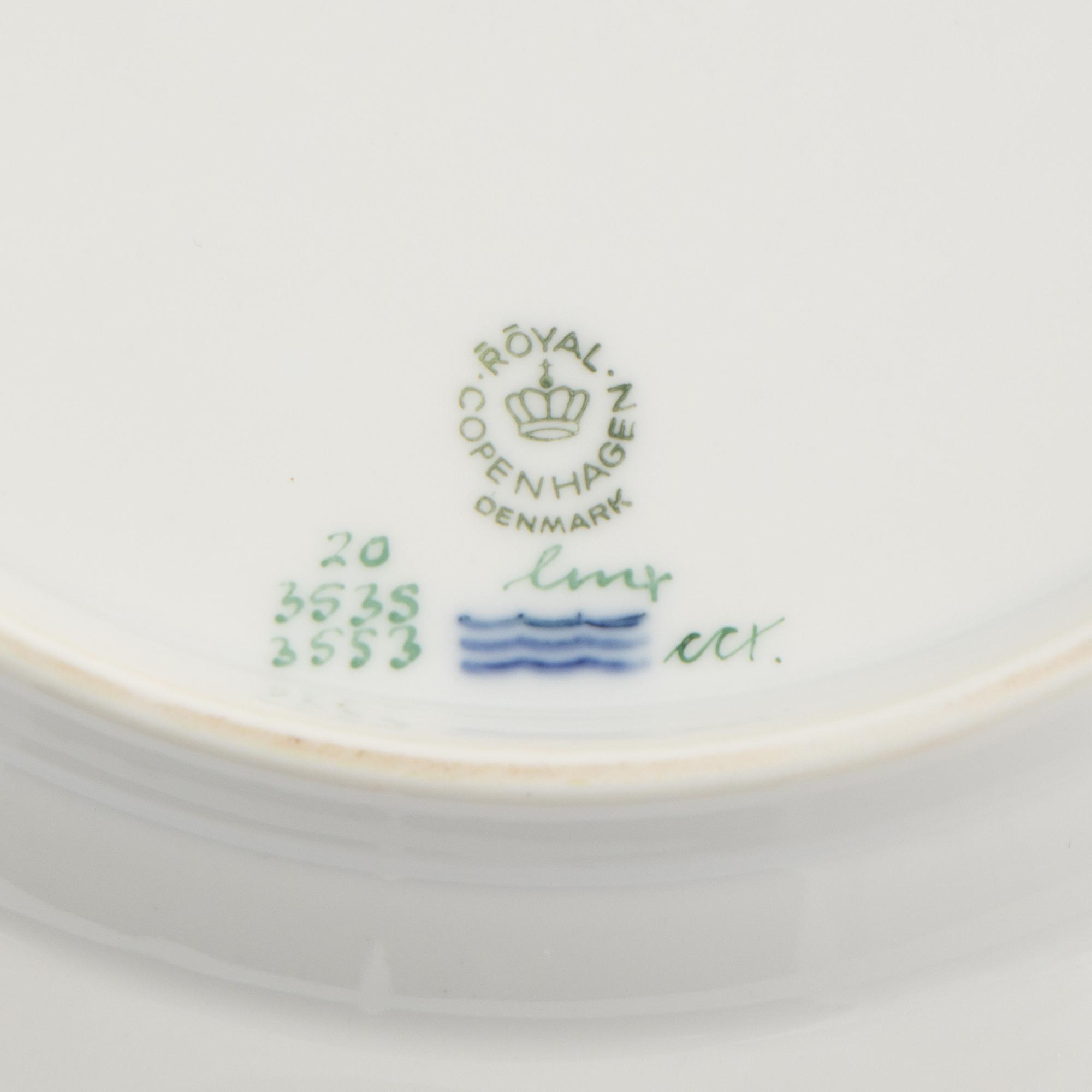 A Set of Nine Royal Copenhagen Flora Danica Porcelain Dinner Plates