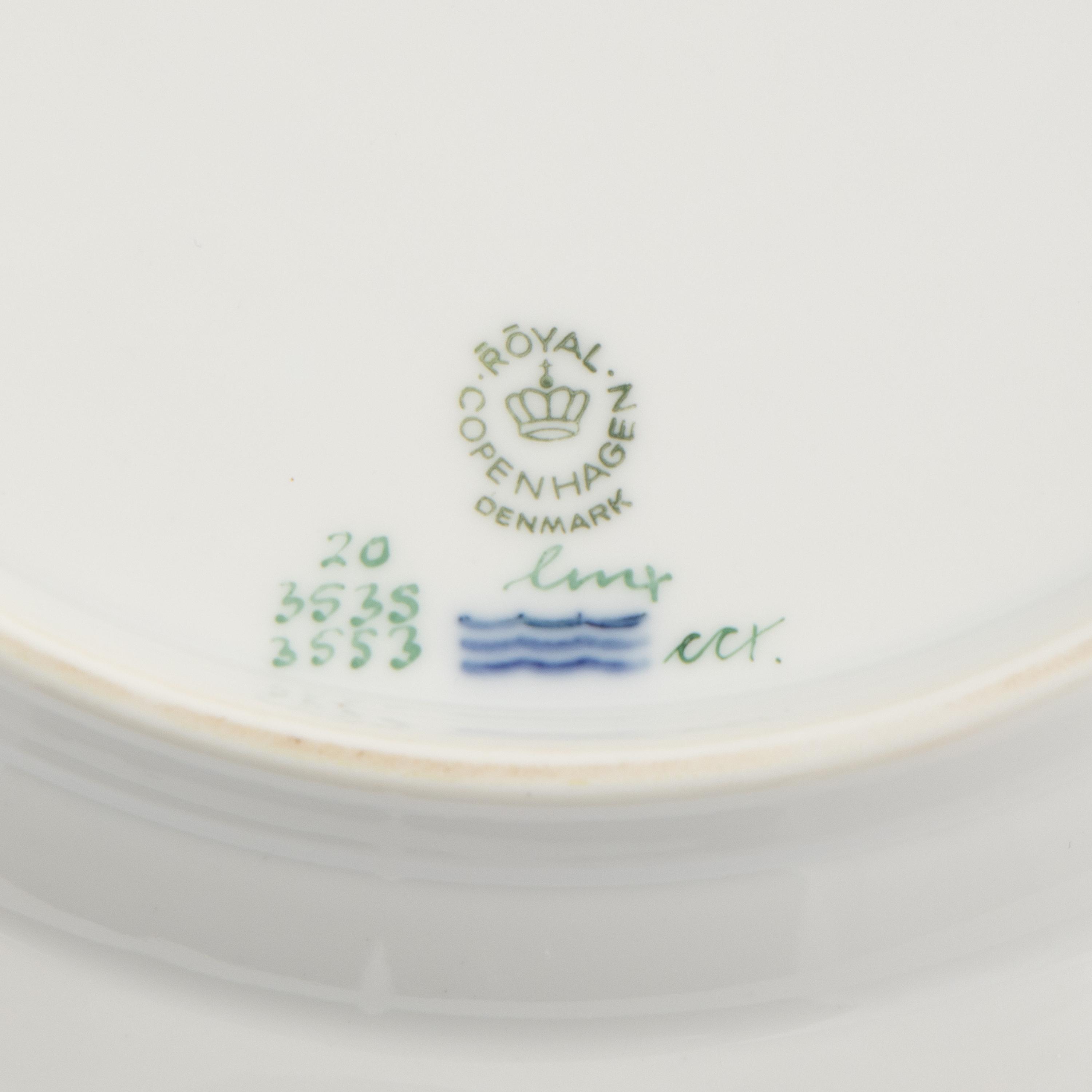A Set of Nine Royal Copenhagen Flora Danica Porcelain Dinner Plates