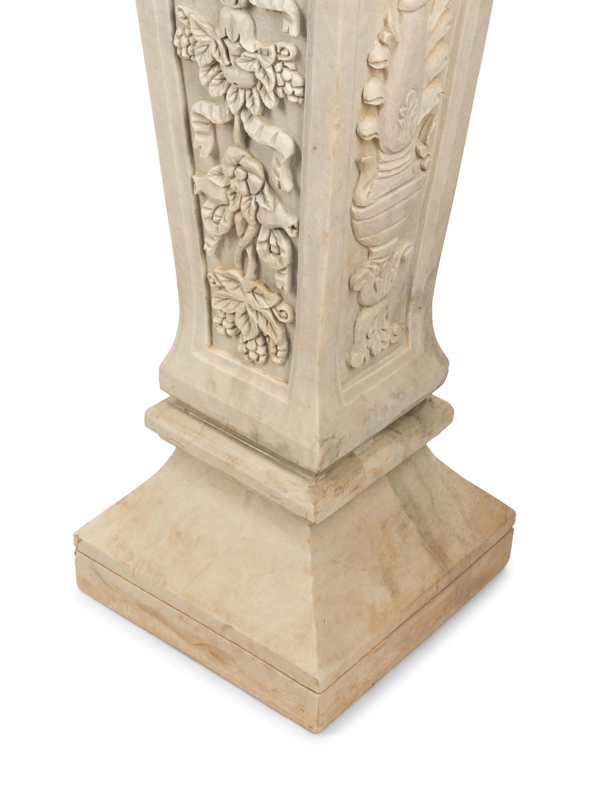 A Pair of Italian Carved Marble Pedestals