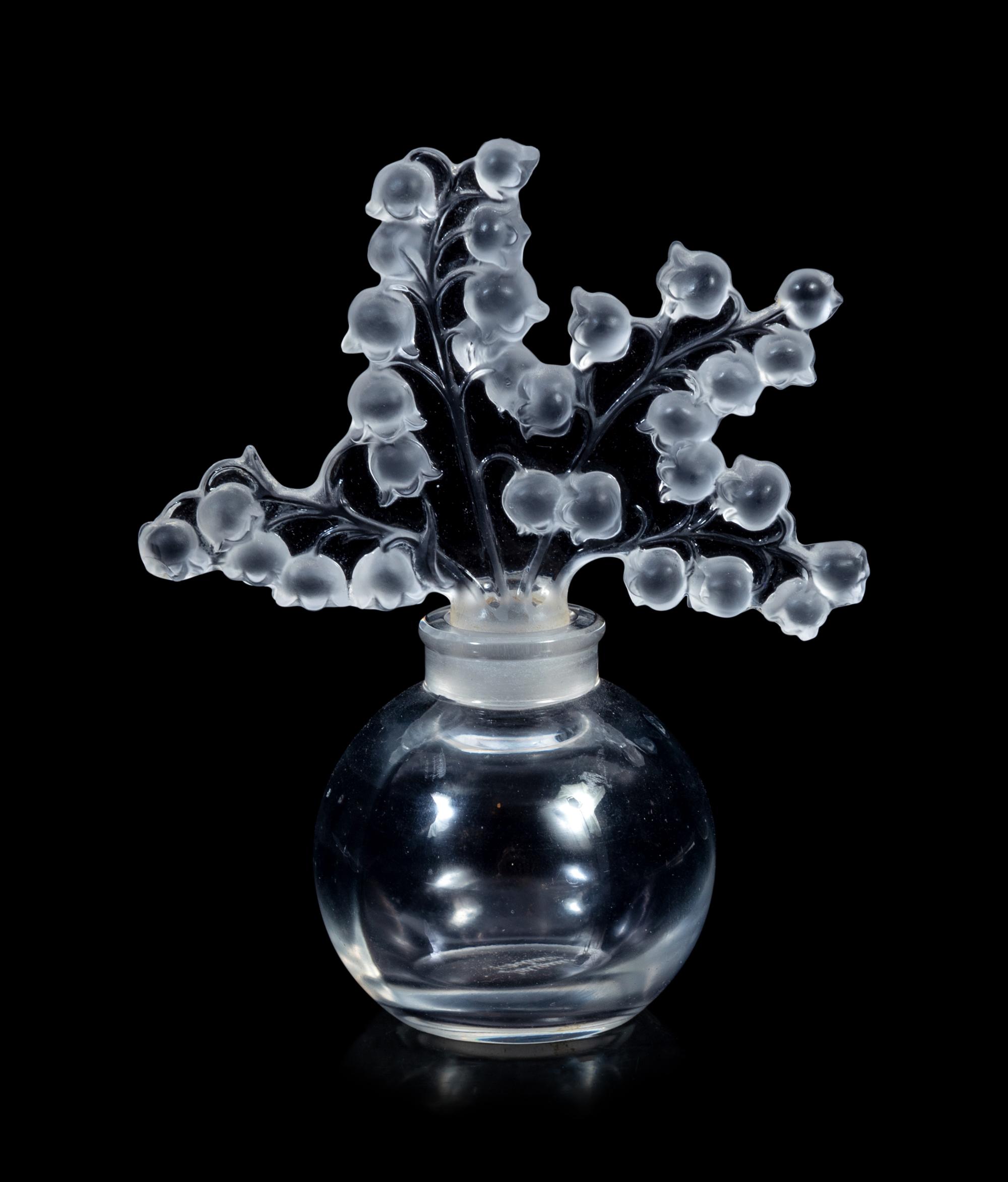 Two Lalique Boxes, a Lalique Coupe and a Lalique Clairefontaine Perfume Bottle