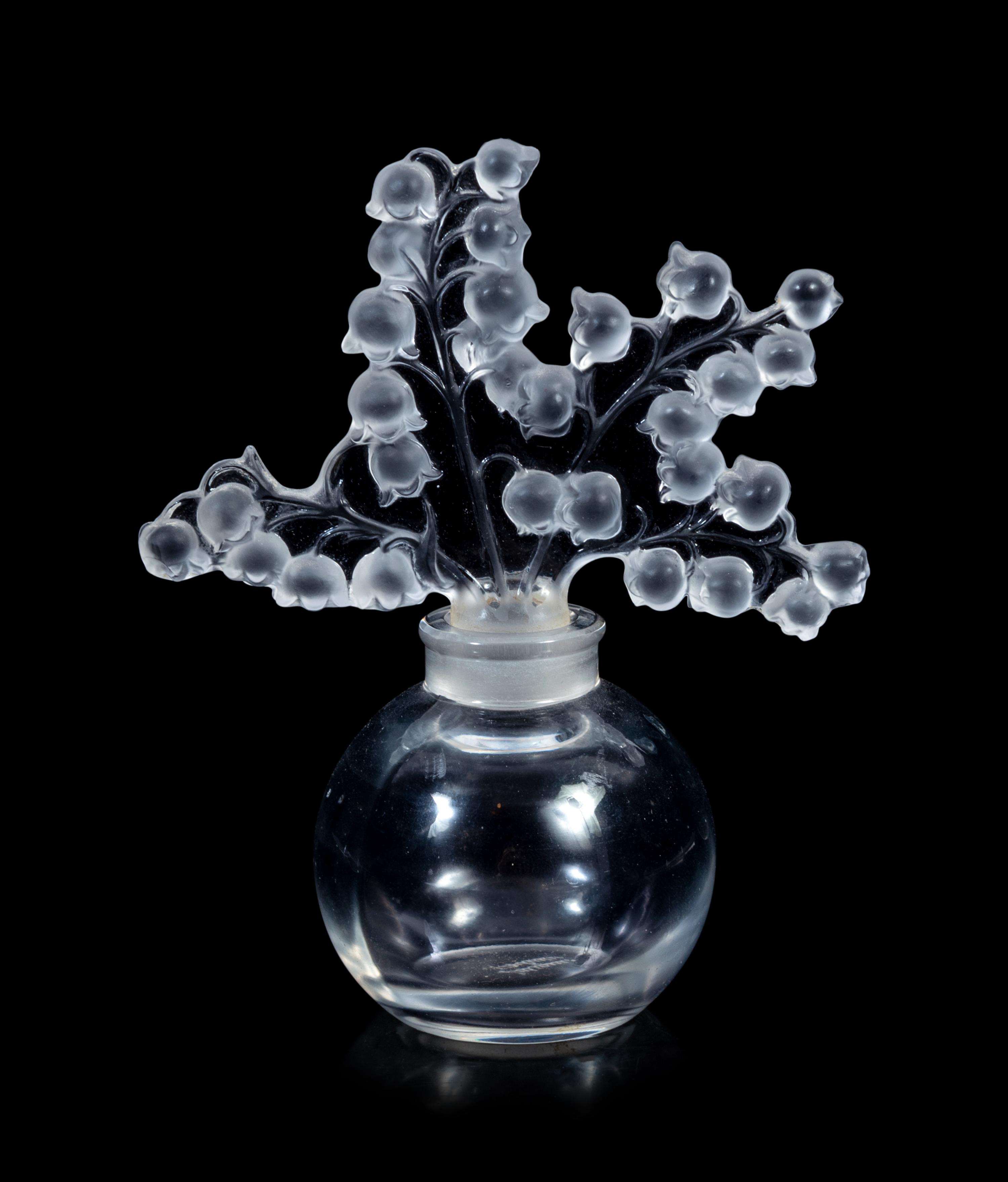 Two Lalique Boxes, a Lalique Coupe and a Lalique Clairefontaine Perfume Bottle