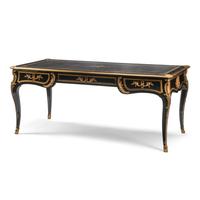 A Louis XV Style Ebonized and Gilt Bronze Mounted Bureau Plat