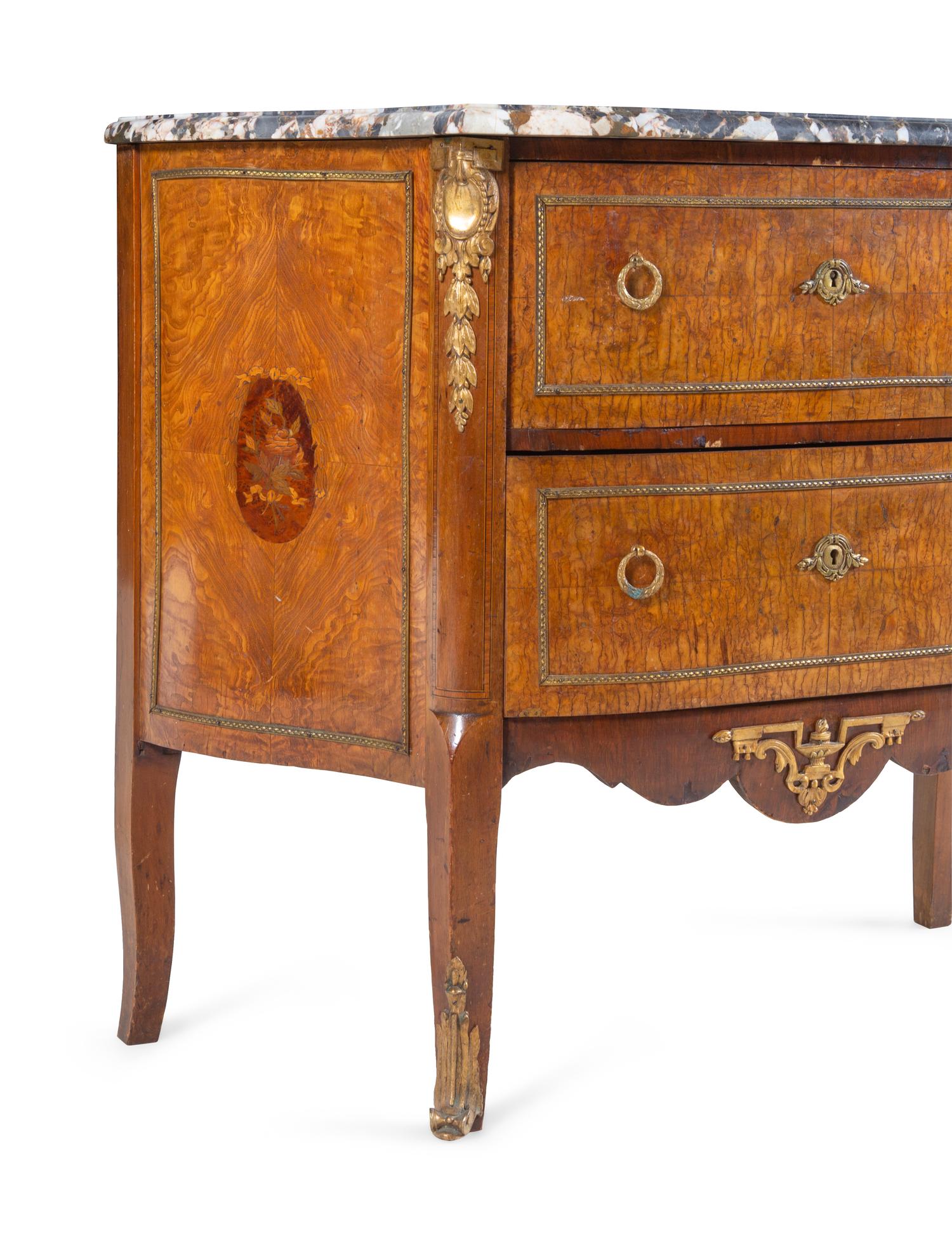 A Louis XV/XVI Transitional Style Gilt Bronze Mounted Marquetry Marble-Top Commode