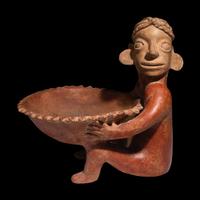 A Jalisco Seated Figure with Offering Bowl