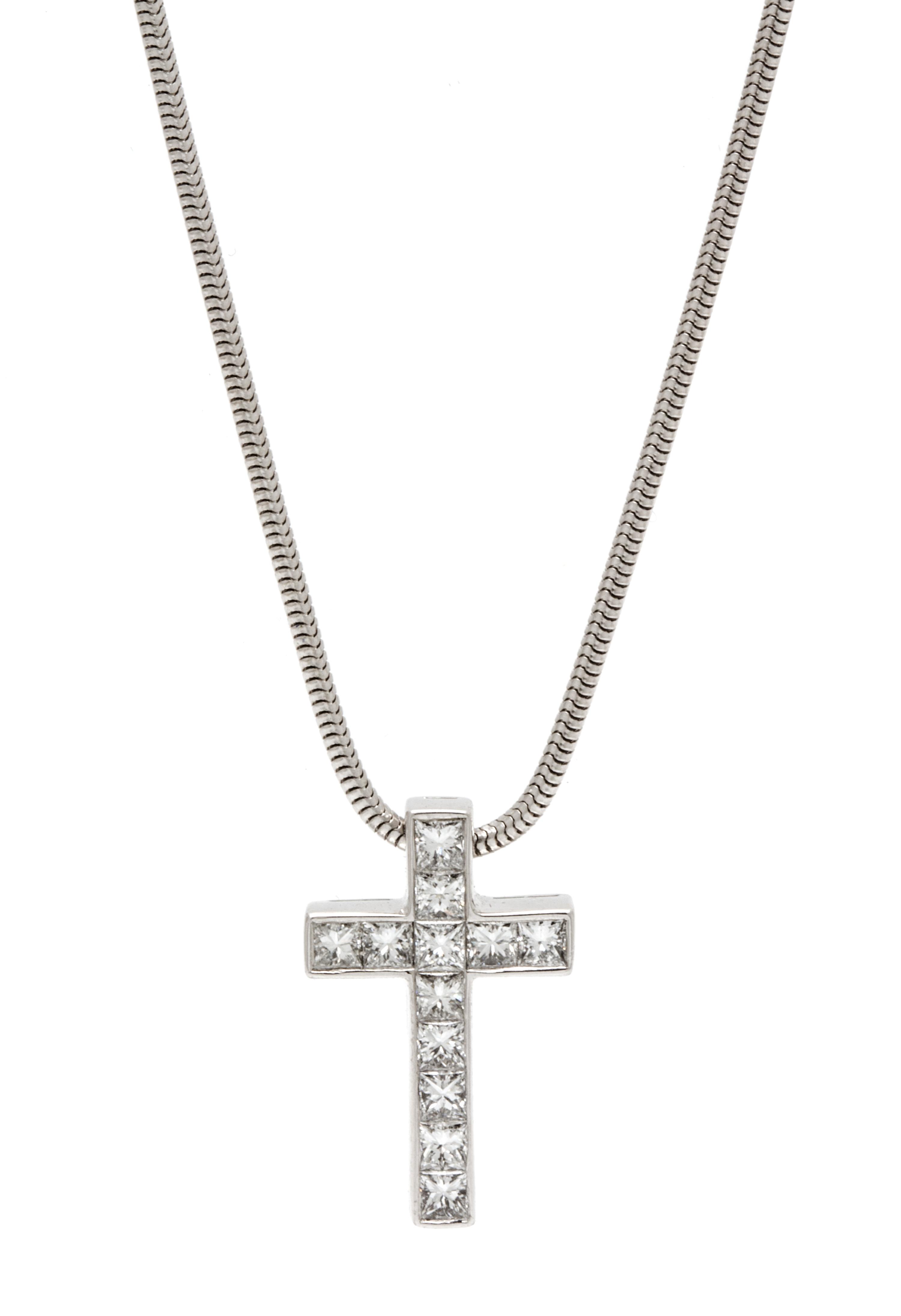 An 18 Karat White Gold and Diamond Cross Pendant, 4.90 dwts.