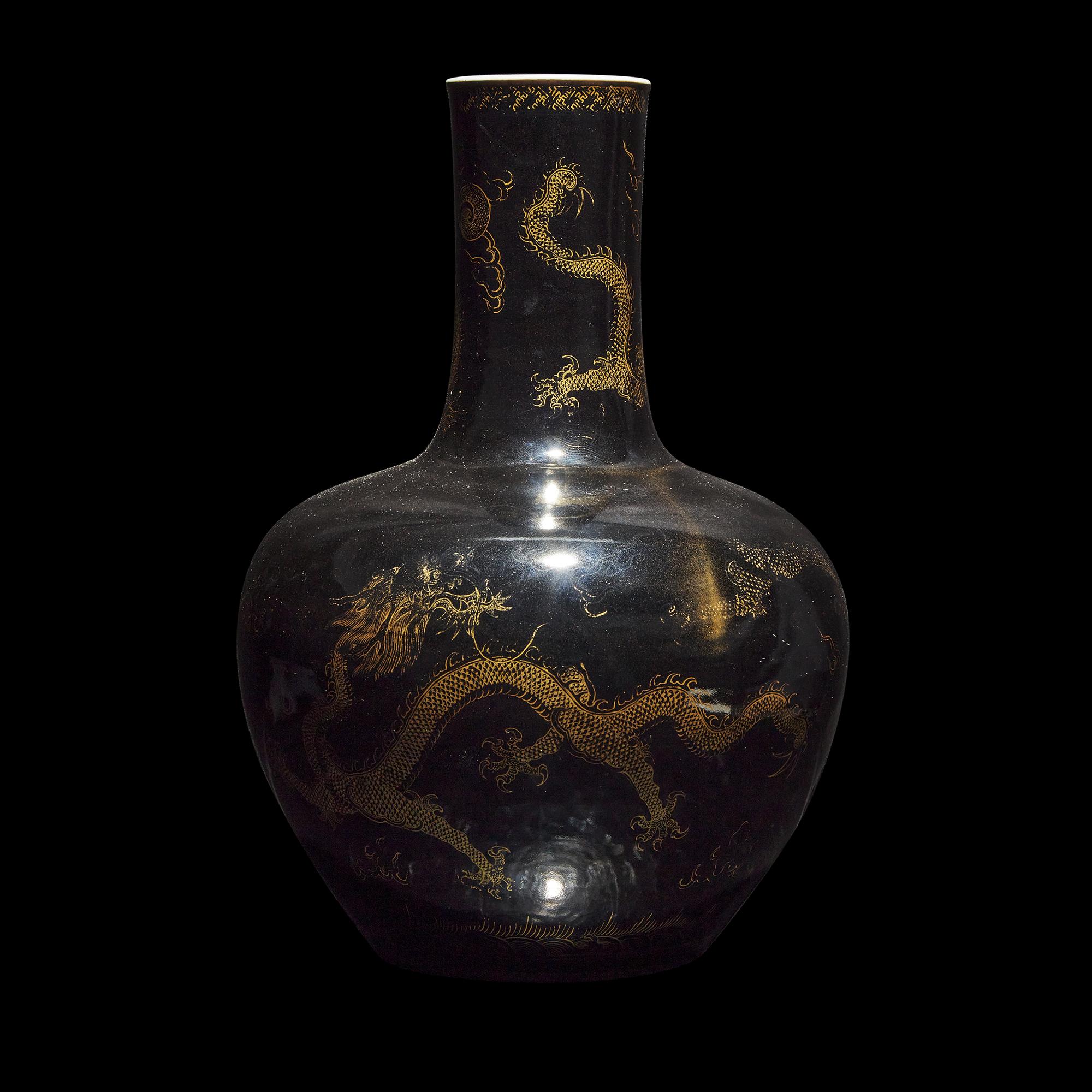 A Large Chinese Gilt-Decorated Black Glazed 'Dragon' Vase, Tianqiuping 黑地描金龍紋天球瓶