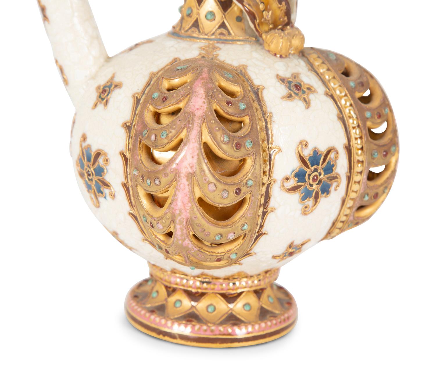 A Continental Polychrome and Gilt-Encrusted Porcelain Ewer — 19TH CENTURY