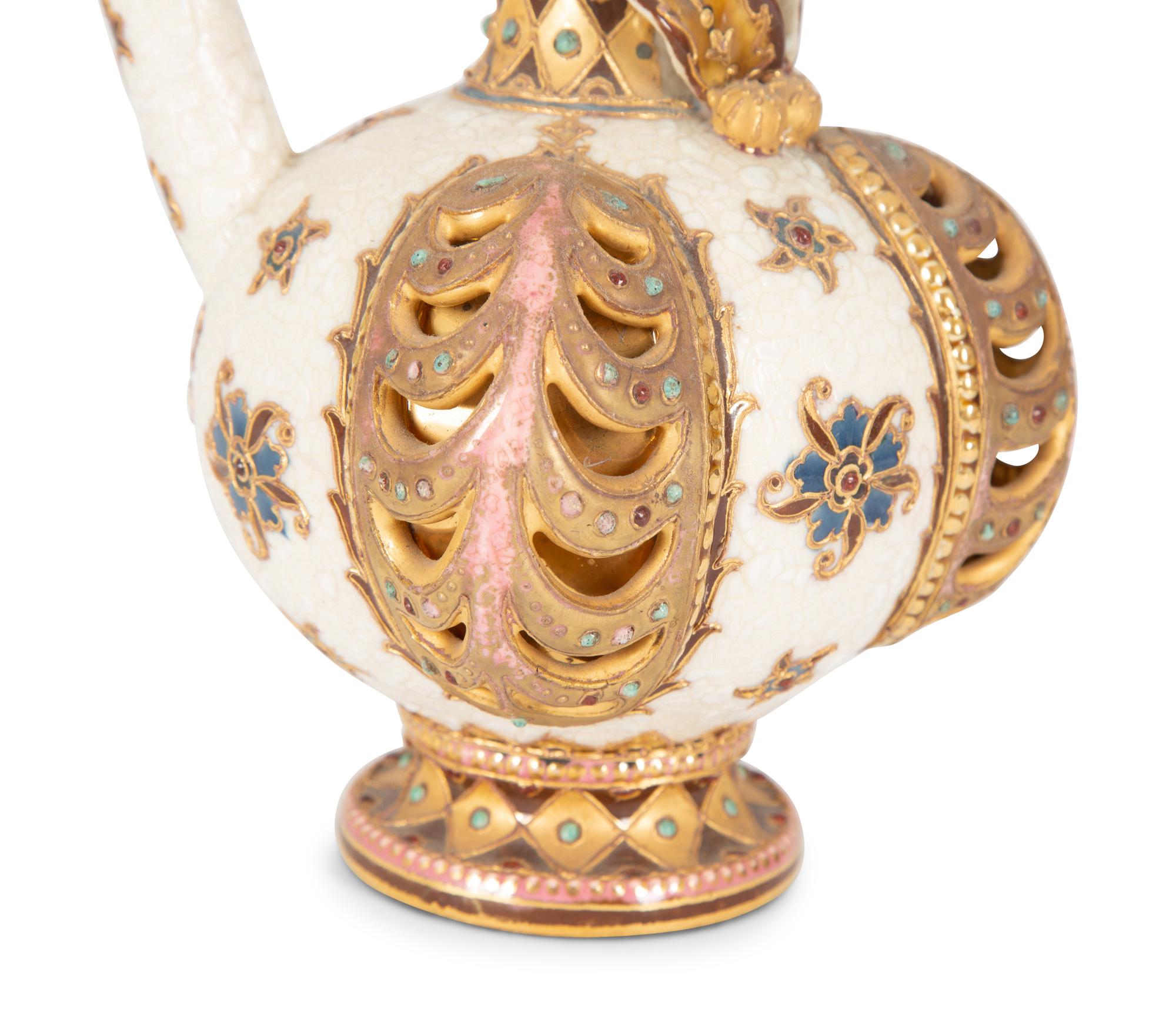 A Continental Polychrome and Gilt-Encrusted Porcelain Ewer — 19TH CENTURY