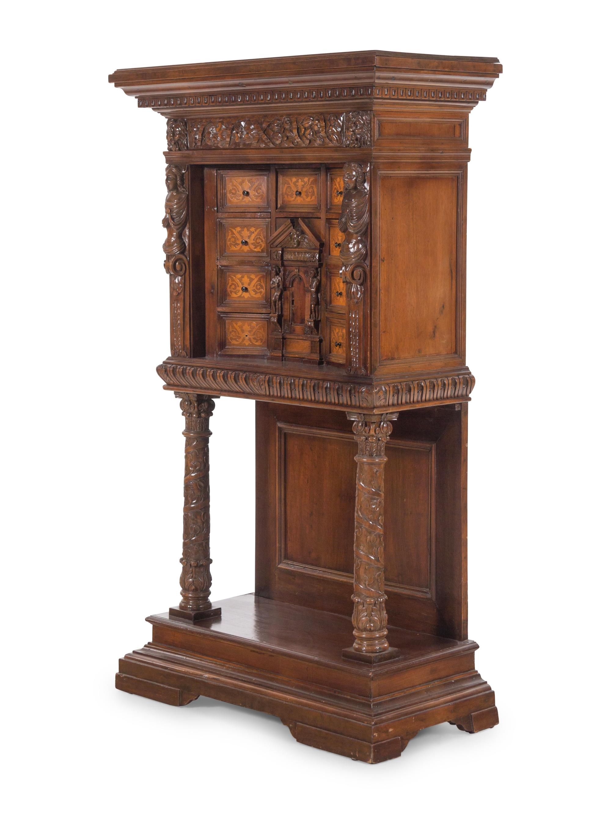A Renaissance Revival Carved Walnut and Marquetry Collector's Cabinet