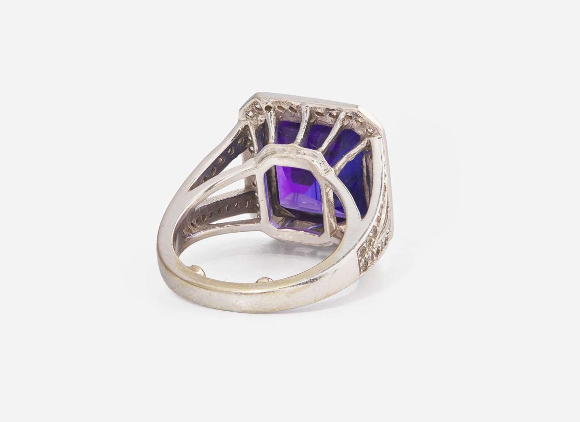 An 18K White Gold, Diamond, and Tanzanite Ring
