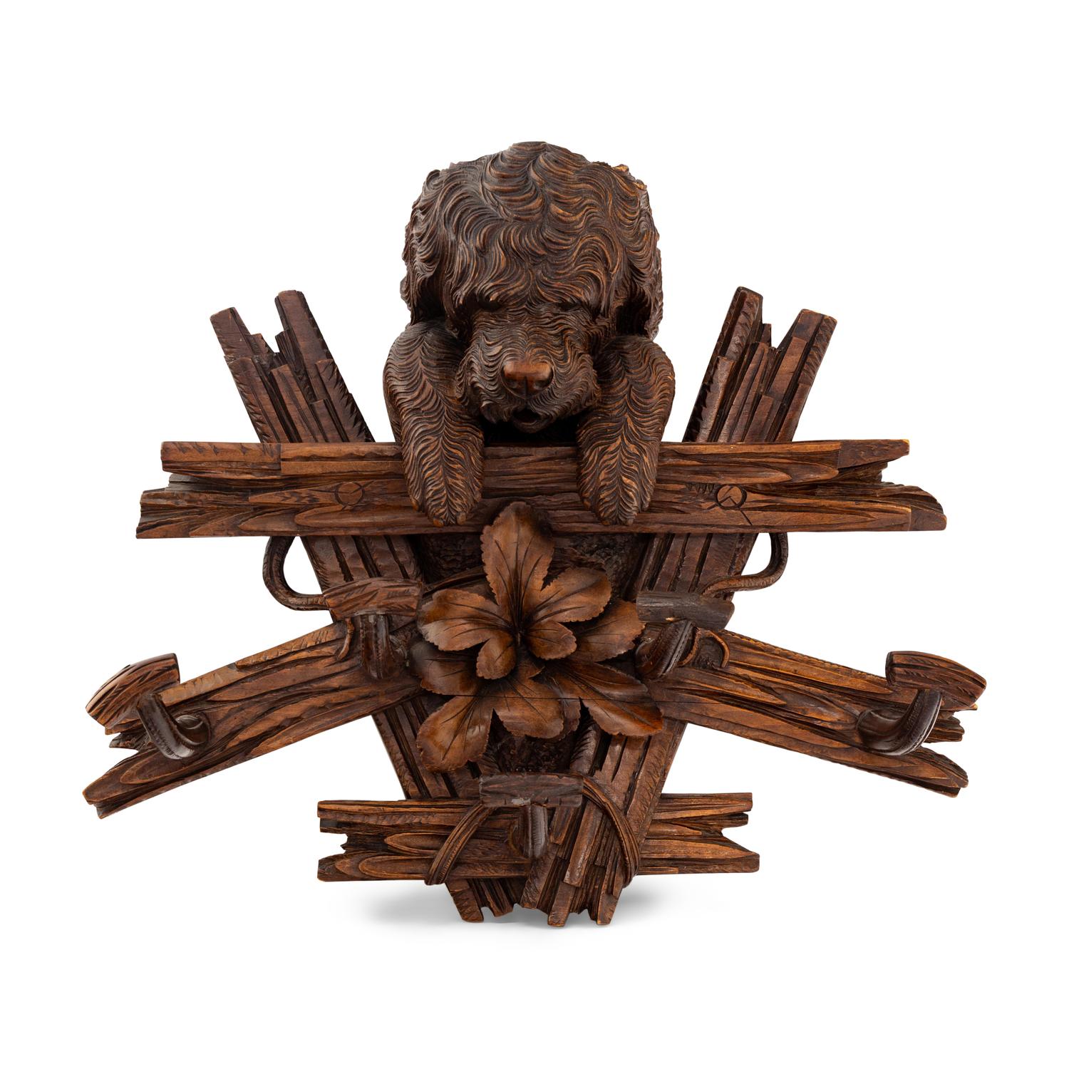 A Swiss "Black Forest" Carved Figural Coat Hook
