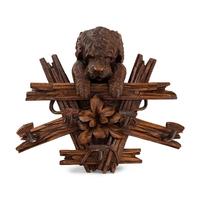 A Swiss "Black Forest" Carved Figural Coat Hook