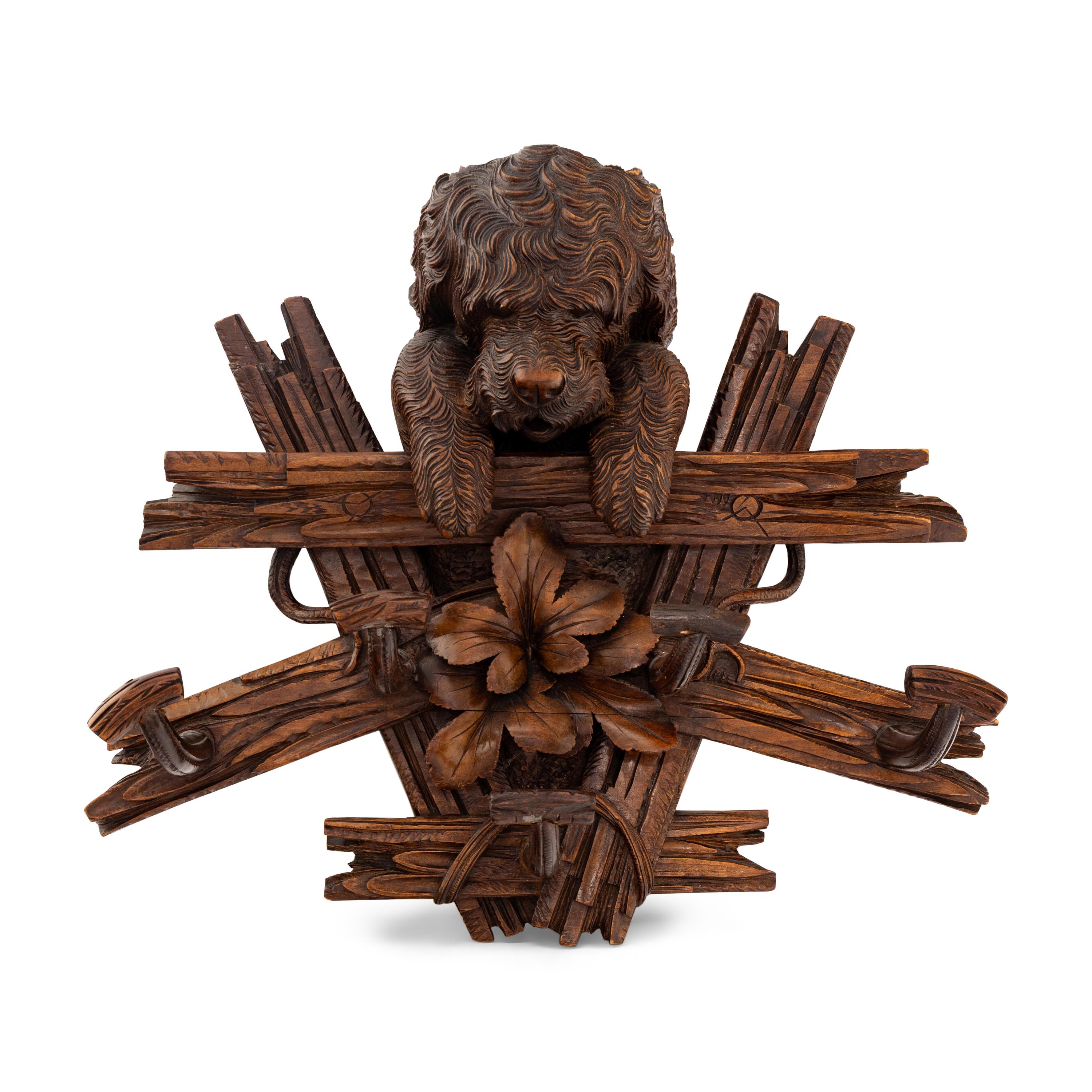 A Swiss "Black Forest" Carved Figural Coat Hook
