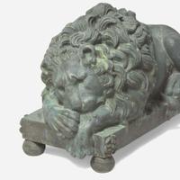 After Antonio Canova (Italian, 1757-1822) A Pair of Bronze Recumbent Lion Garden Sculptures, late 19th / 20th century