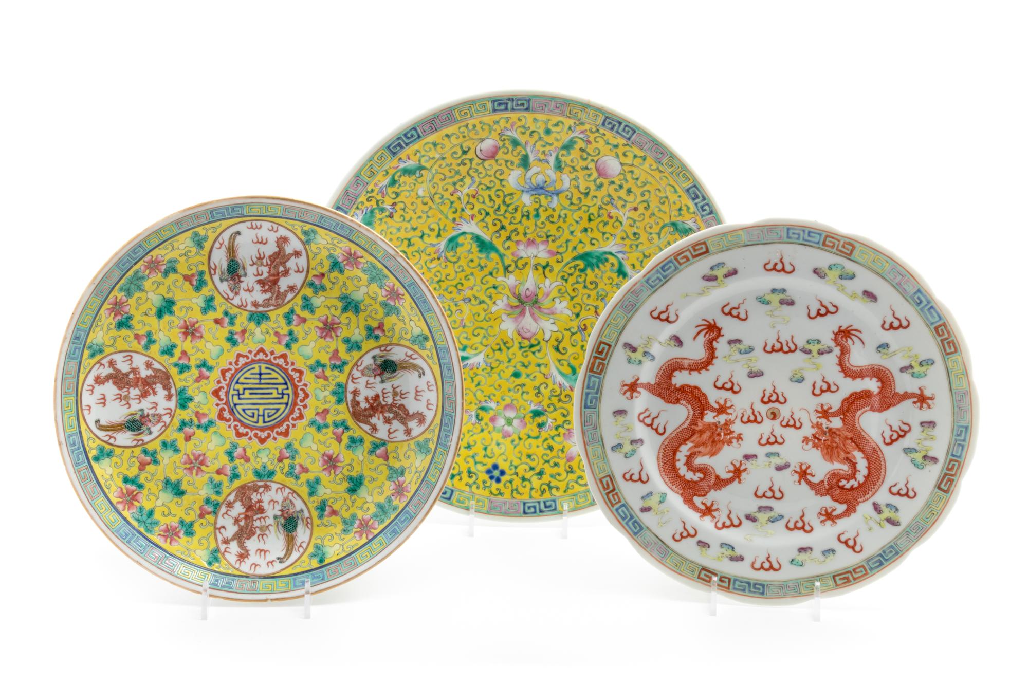 Three Chinese Famille Rose Porcelain Plates Diameter of largest 12 inches.