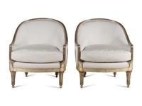 A Pair of Ebanista Silvered Wood Bergeres