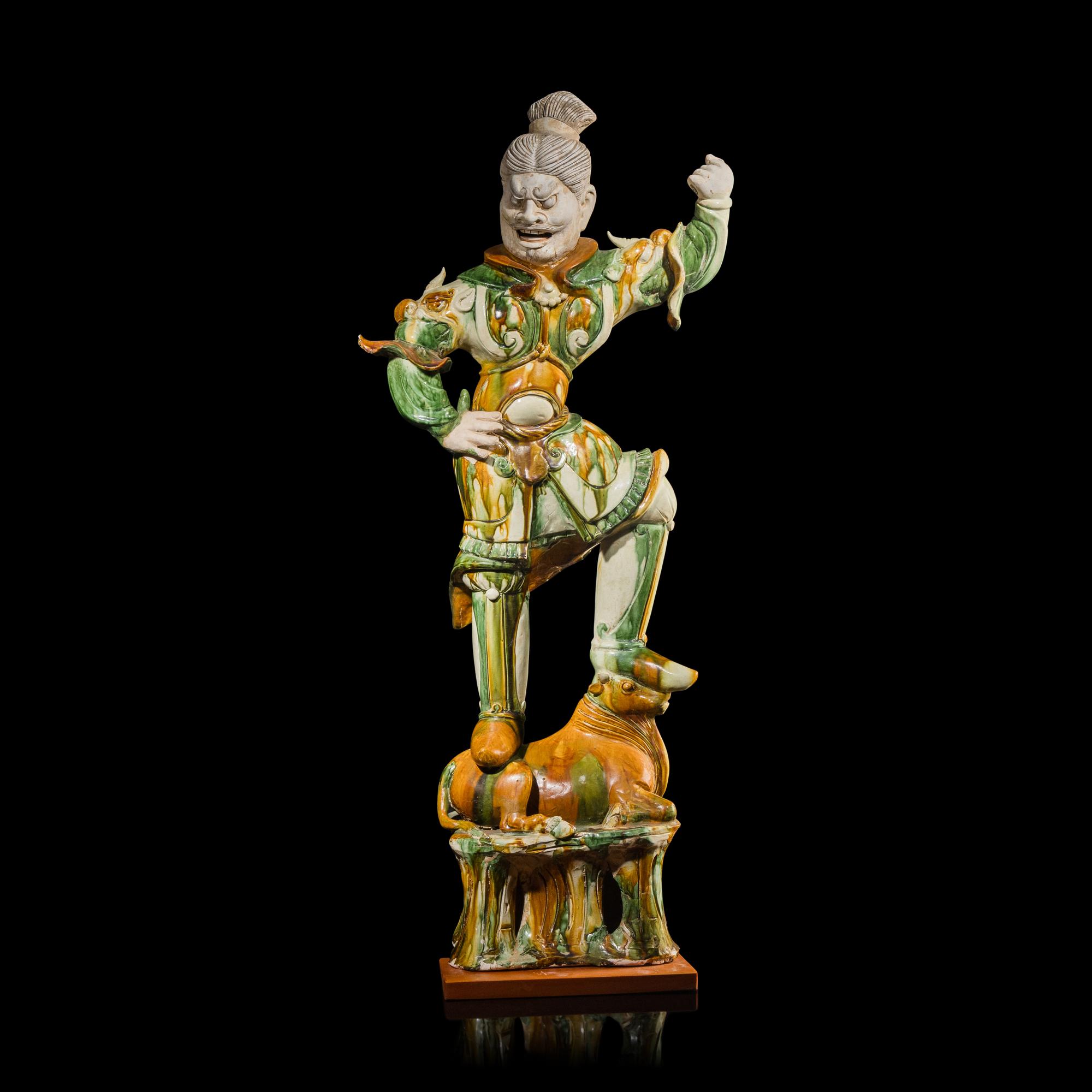 A Chinese Sancai Glazed Pottery Figure of a Lokapala, Tang Dynasty — 唐 三彩天王俑