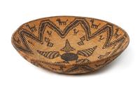 An Apache Pictorial Basketry Tray Height 4 1/4 x diameter 17 1/4 inches.
