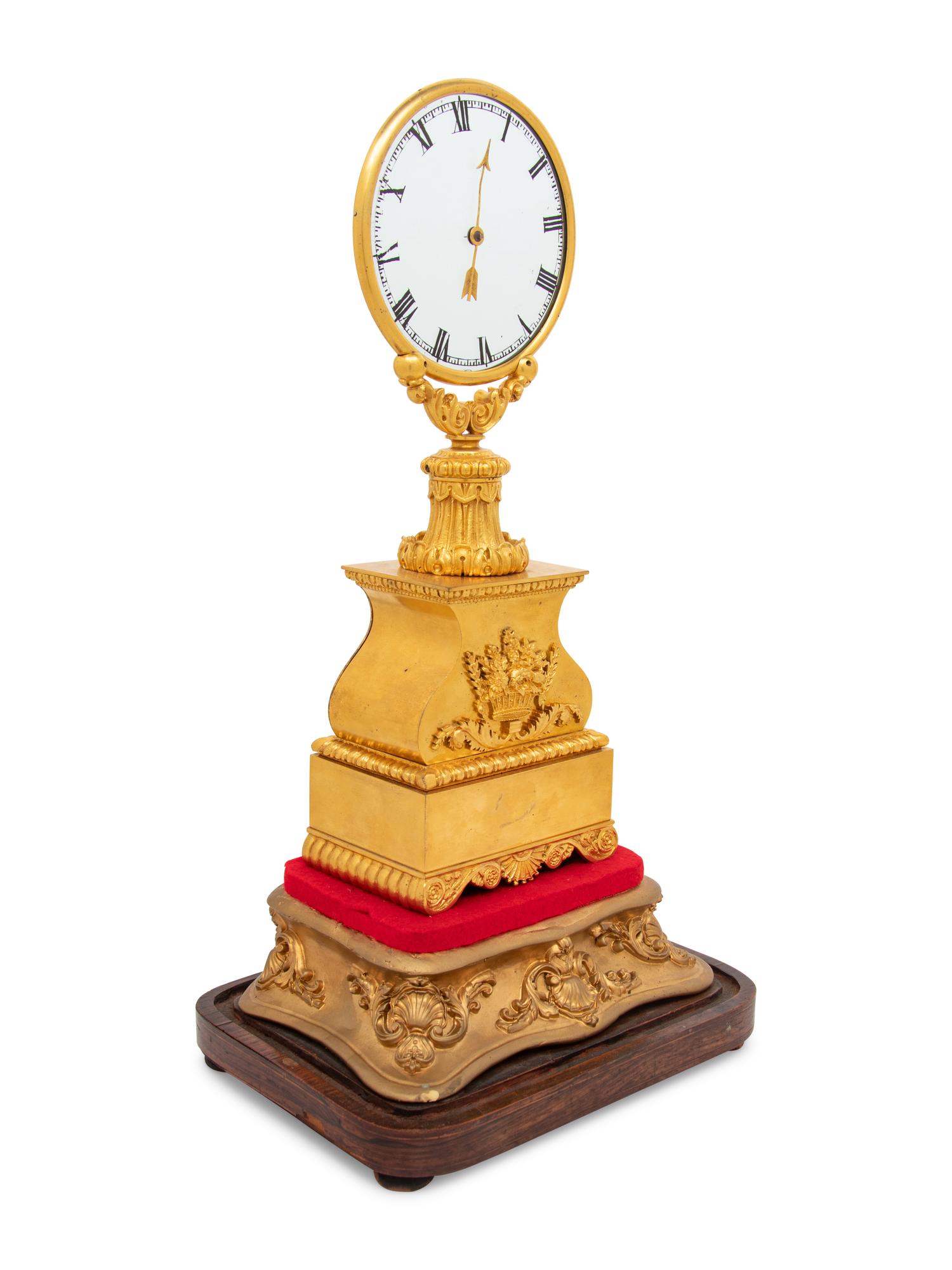 A Louis Philippe Gilt Bronze Mystery Clock