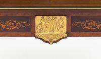 A Victorian Gilt Metal Mounted Amboyna and Marquetry Center Table