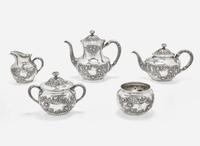 A five-piece sterling silver floral repoussé tea and coffee service, Gorham Mfg. Co., Providence, RI, bearing date mark for 1883