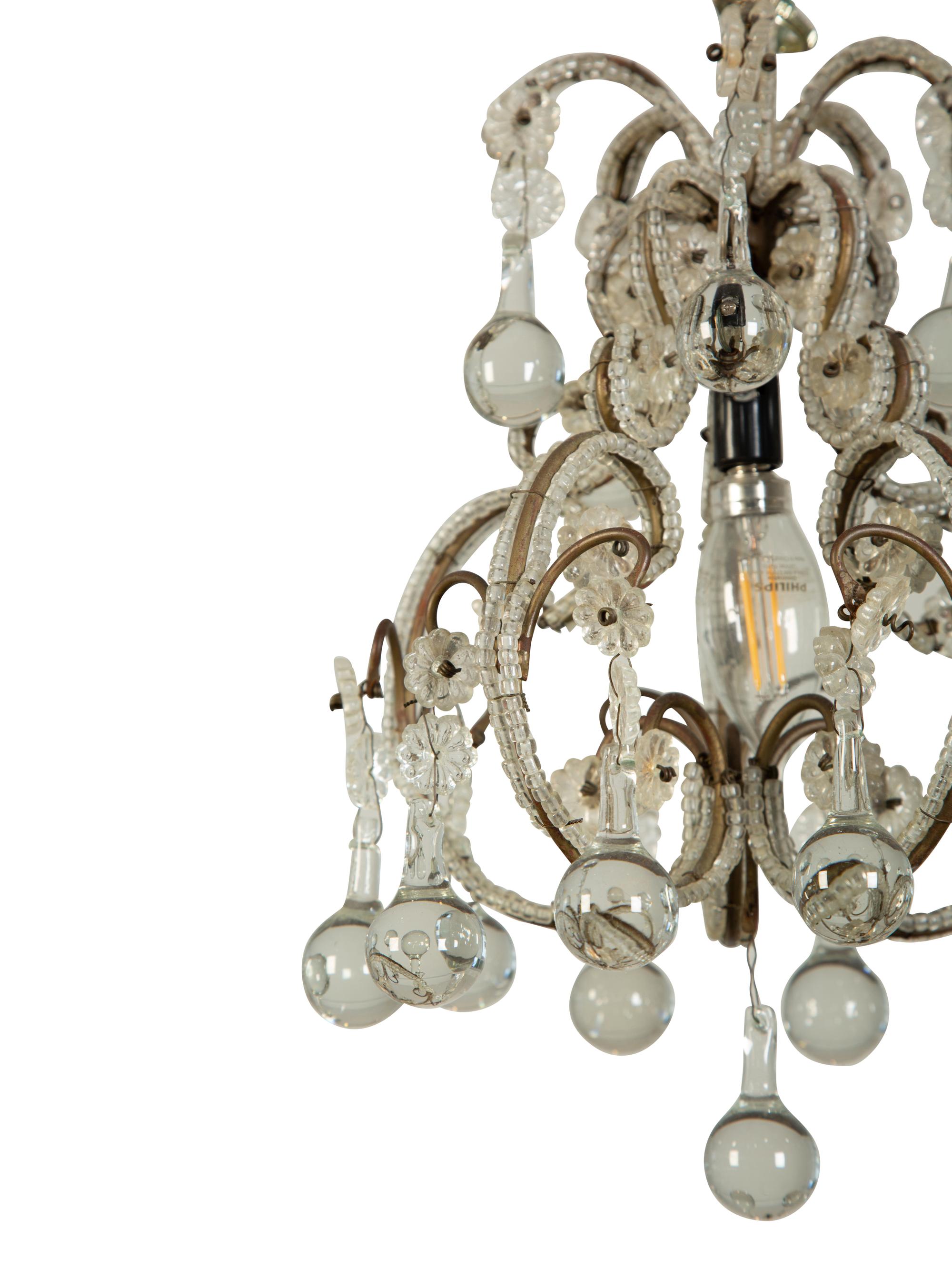 A Pair of Gilt Metal and Glass-Beaded Chandeliers