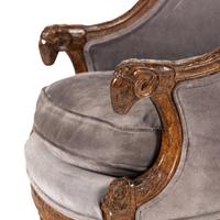 A Pair of Directoire Style Carved Walnut Tub Armchairs