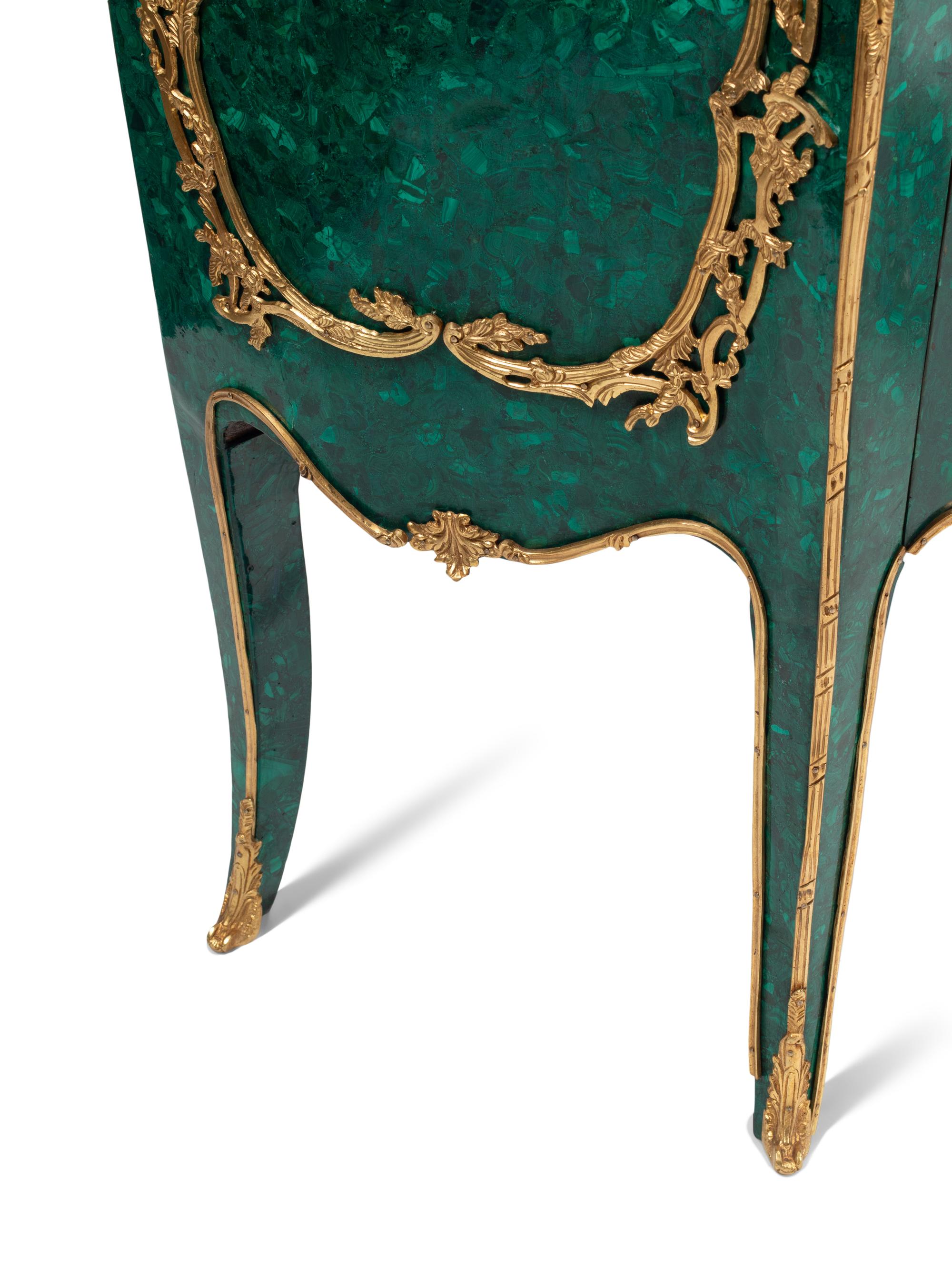 A Pair of Louis XV Style Gilt Bronze Mounted Malachite Cabinets