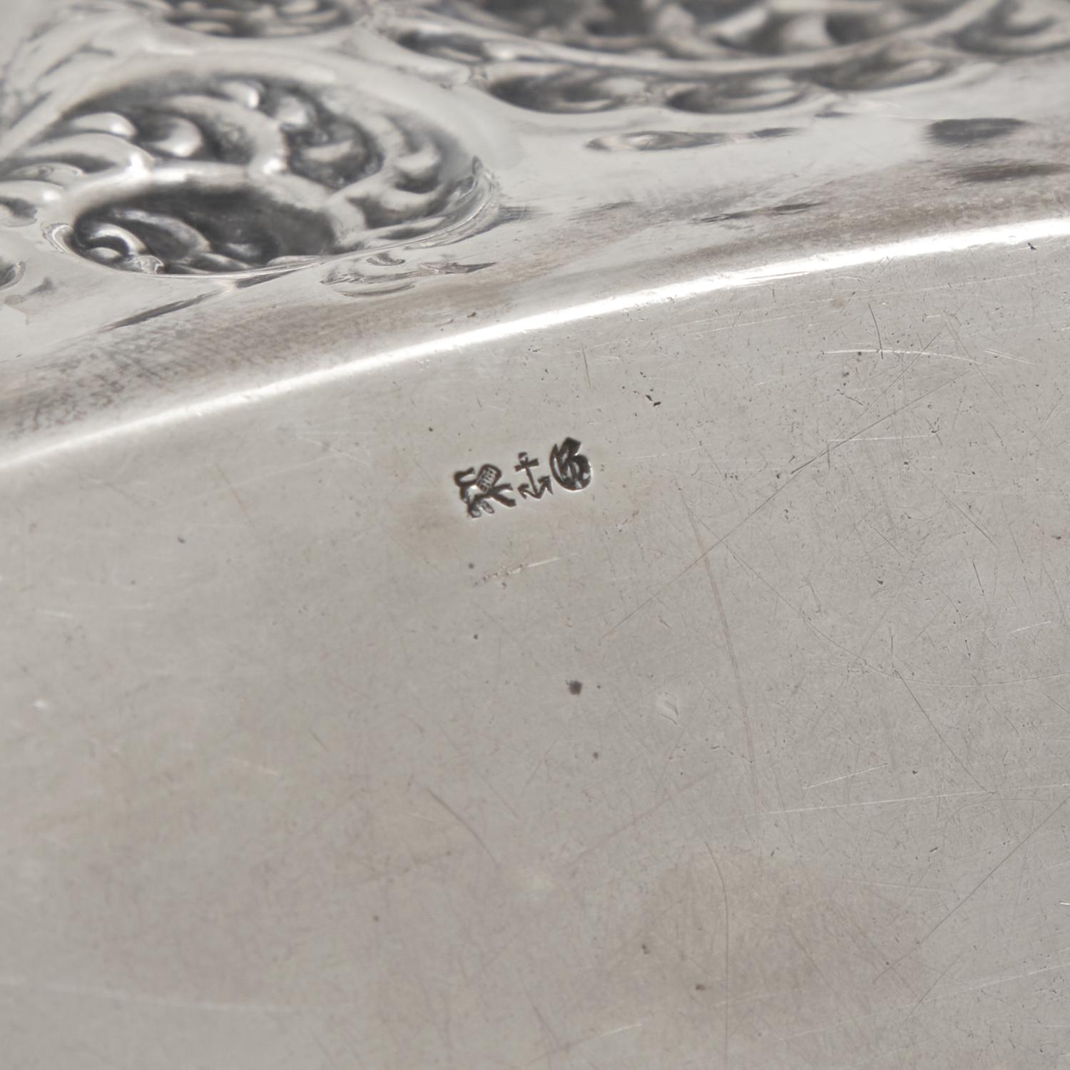 An American Aesthetic Movement Silver Repousse Bread Dish