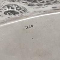 An American Aesthetic Movement Silver Repousse Bread Dish