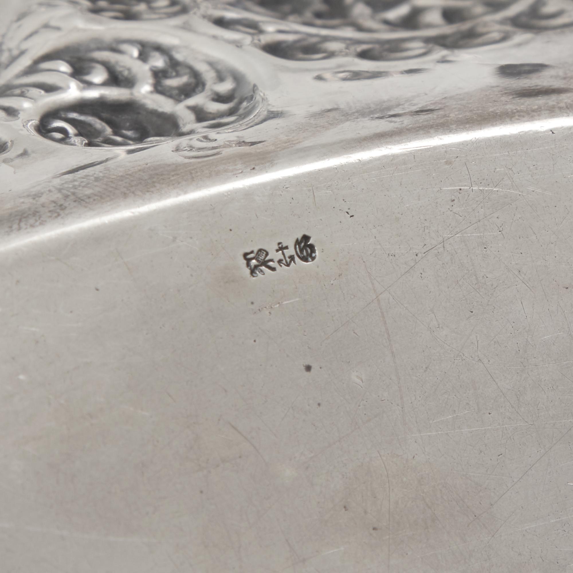 An American Aesthetic Movement Silver Repousse Bread Dish