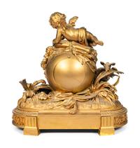 A French Gilt Bronze Figural Clock