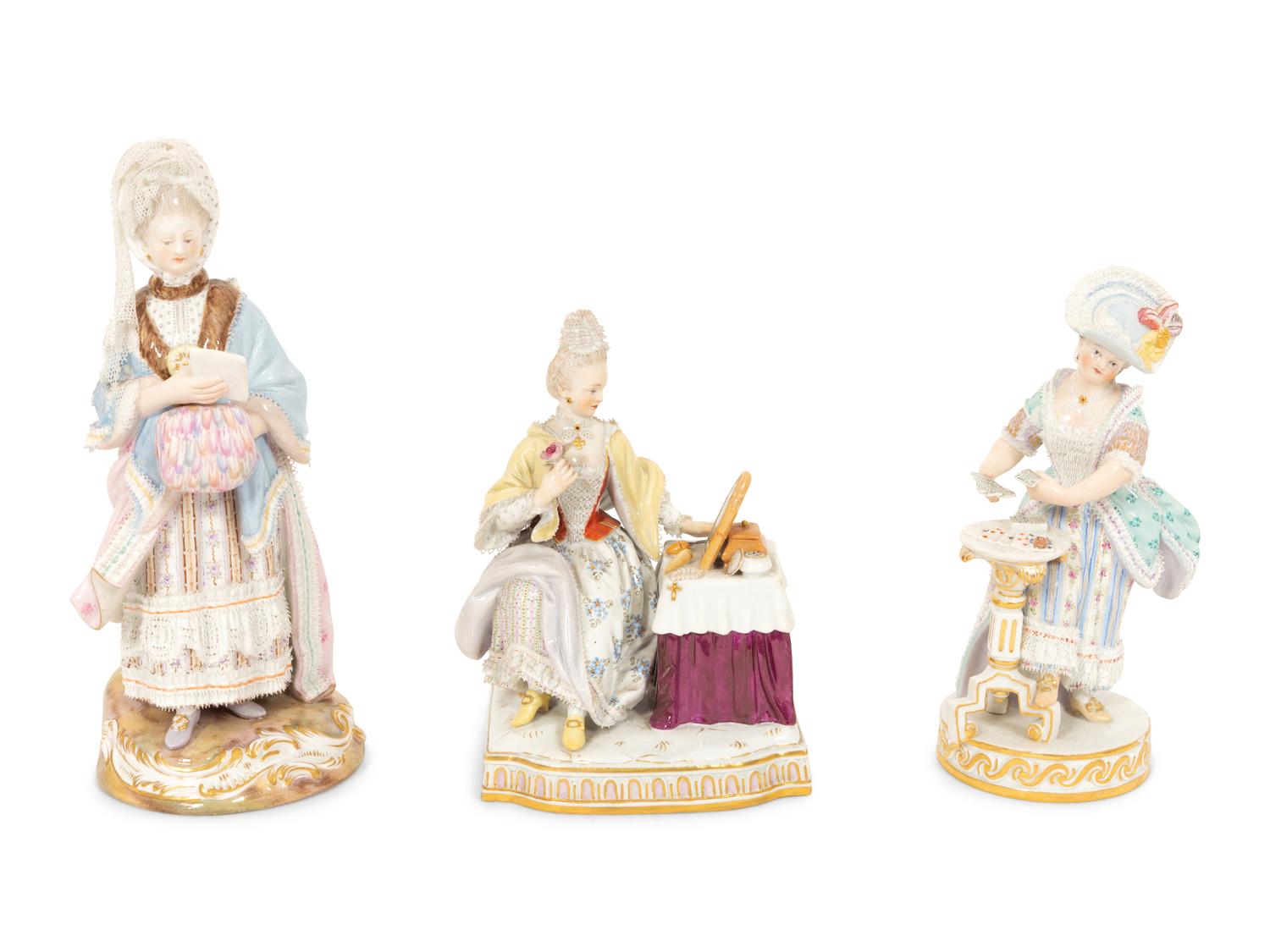 Three Meissen Porcelain Figures of Ladies in Lacy Dresses
