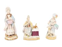 Three Meissen Porcelain Figures of Ladies in Lacy Dresses