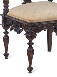 A Renaissance Revival Carved Walnut Corner Chair