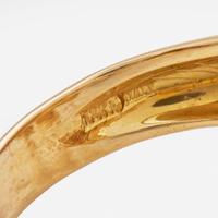 An 18K Yellow Gold and Diamond Ring
