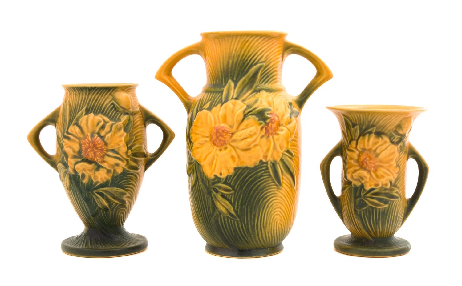 Three Roseville Peony Pottery Vases Height of tallest 9 1/4 inches.
