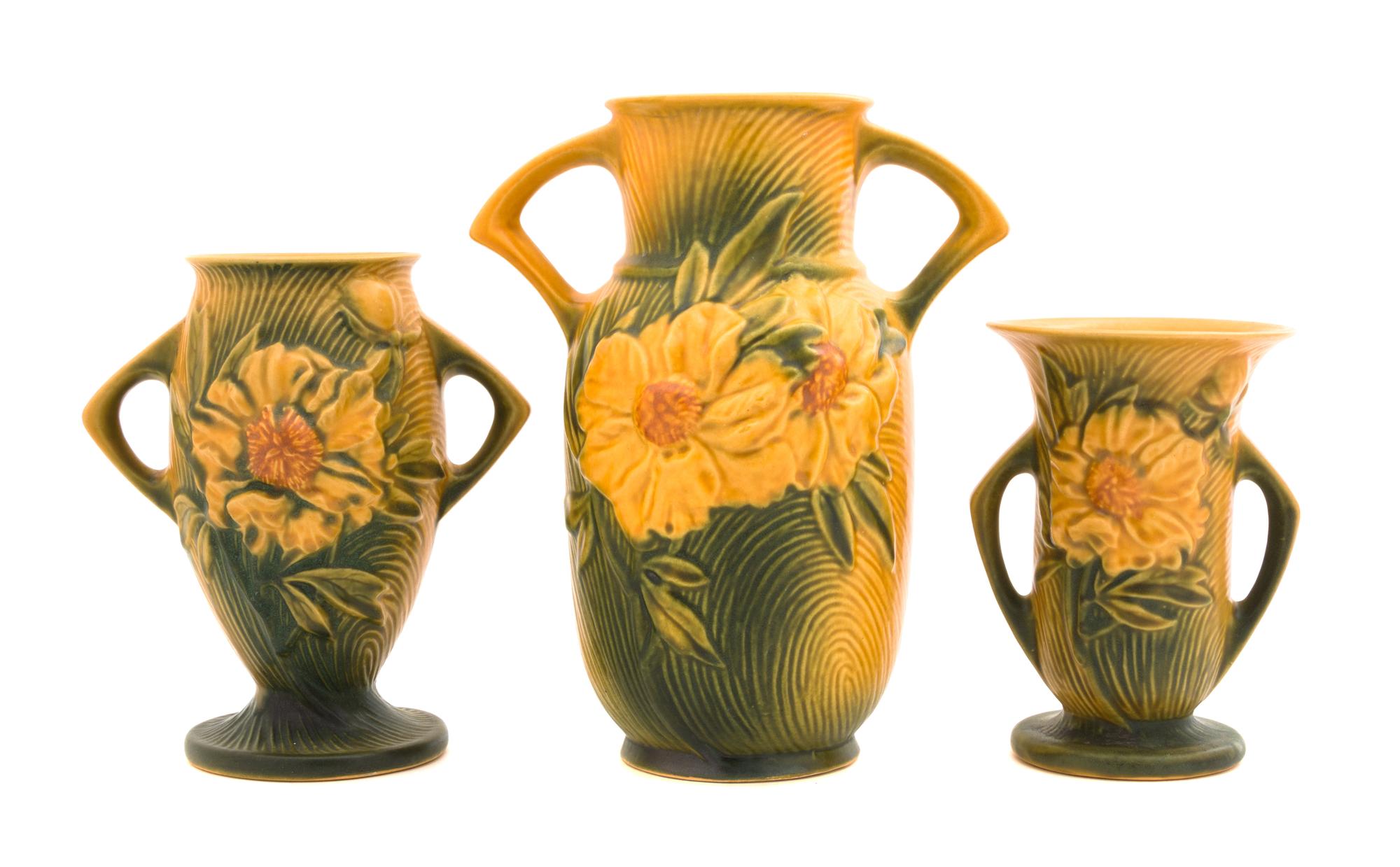 Three Roseville Peony Pottery Vases Height of tallest 9 1/4 inches.