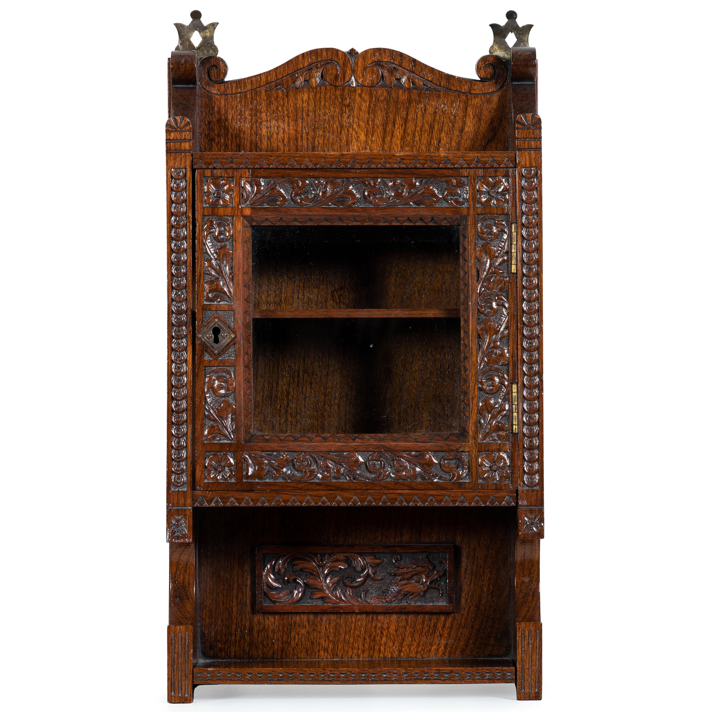 A Cincinnati Art-Carved Wall Cabinet in Walnut