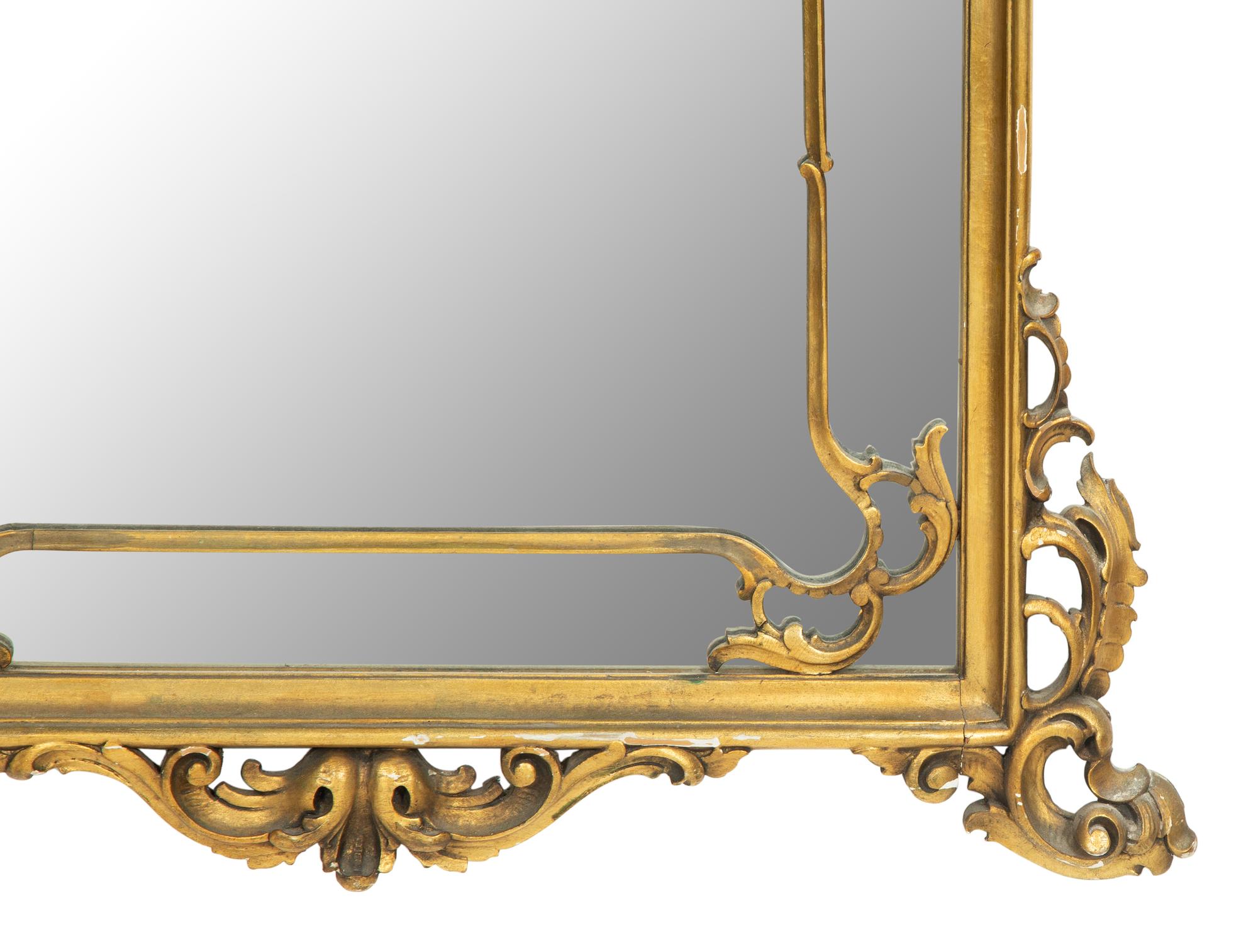 A Pair of Italian Rococo Style Giltwood Mirrors