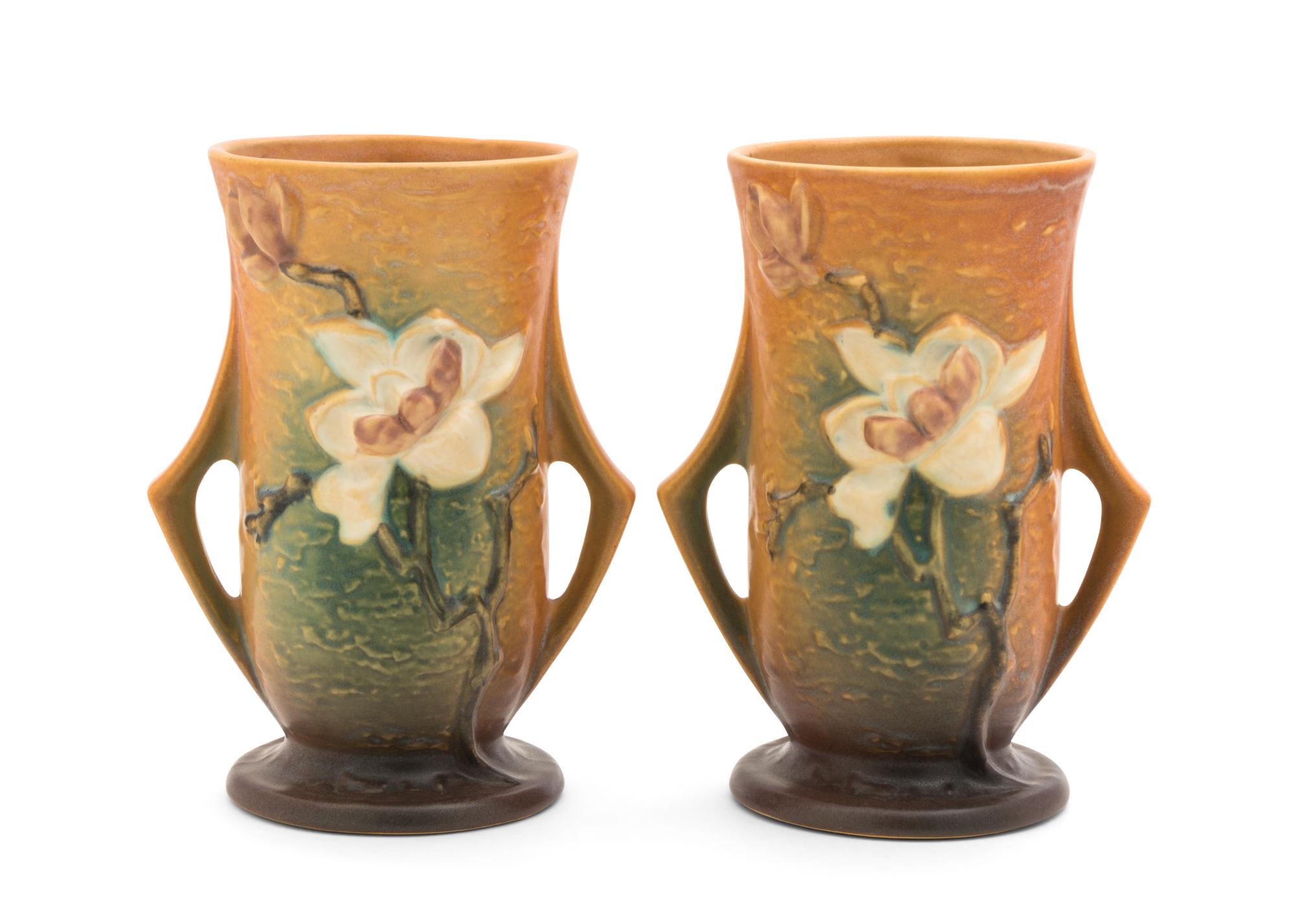 A Pair of Roseville Magnolia Pottery Vases Height 7 1/2 inches.