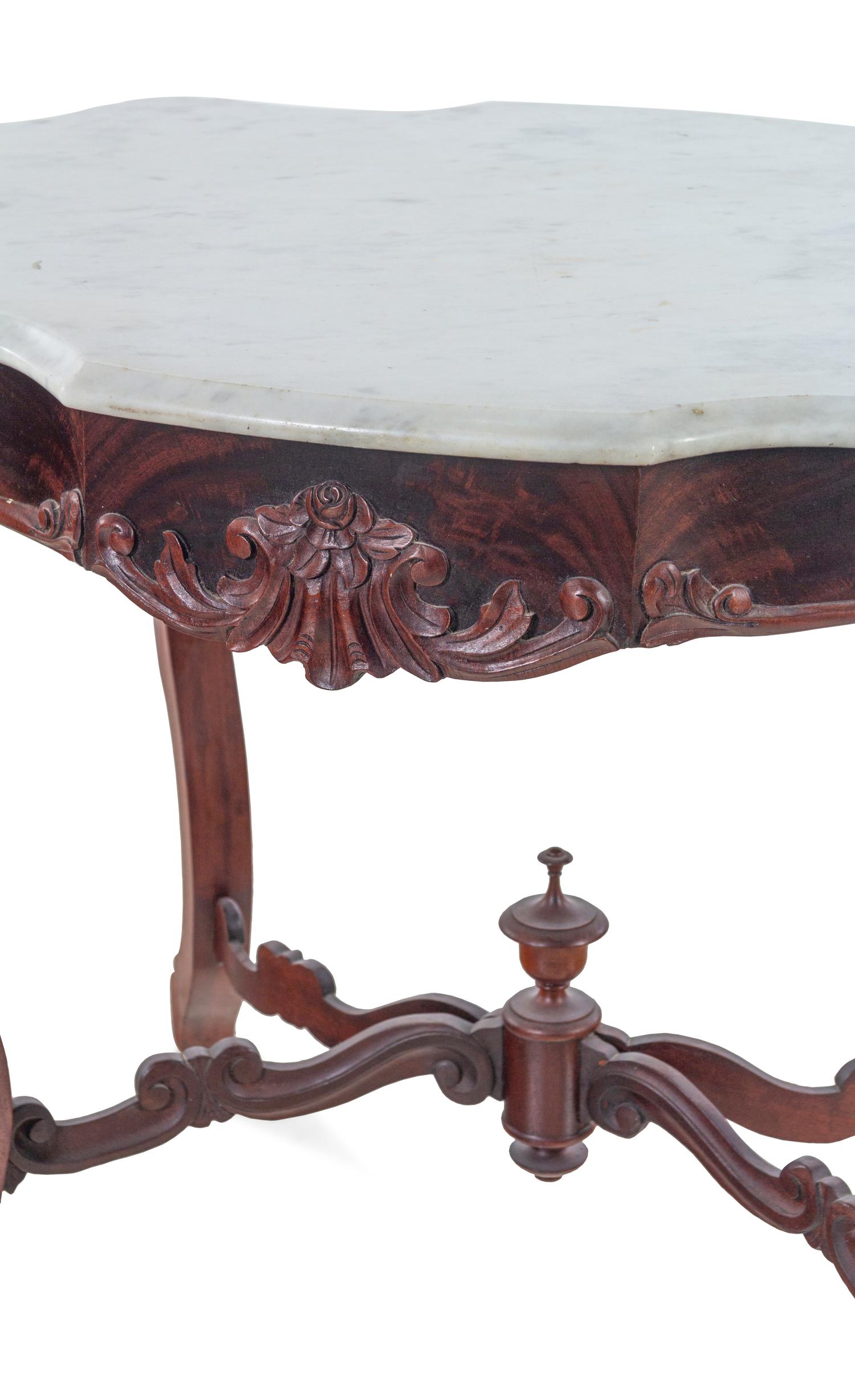 A Victorian Mahogany Marble-Top Table