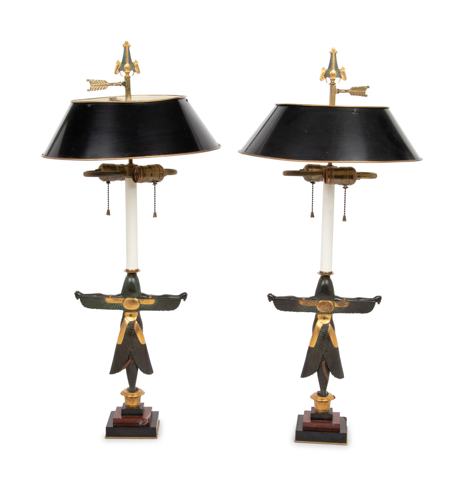 A Pair of Egyptian Revival Parcel Gilt Bronze Figures Mounted as Lamps with Tole Shades
