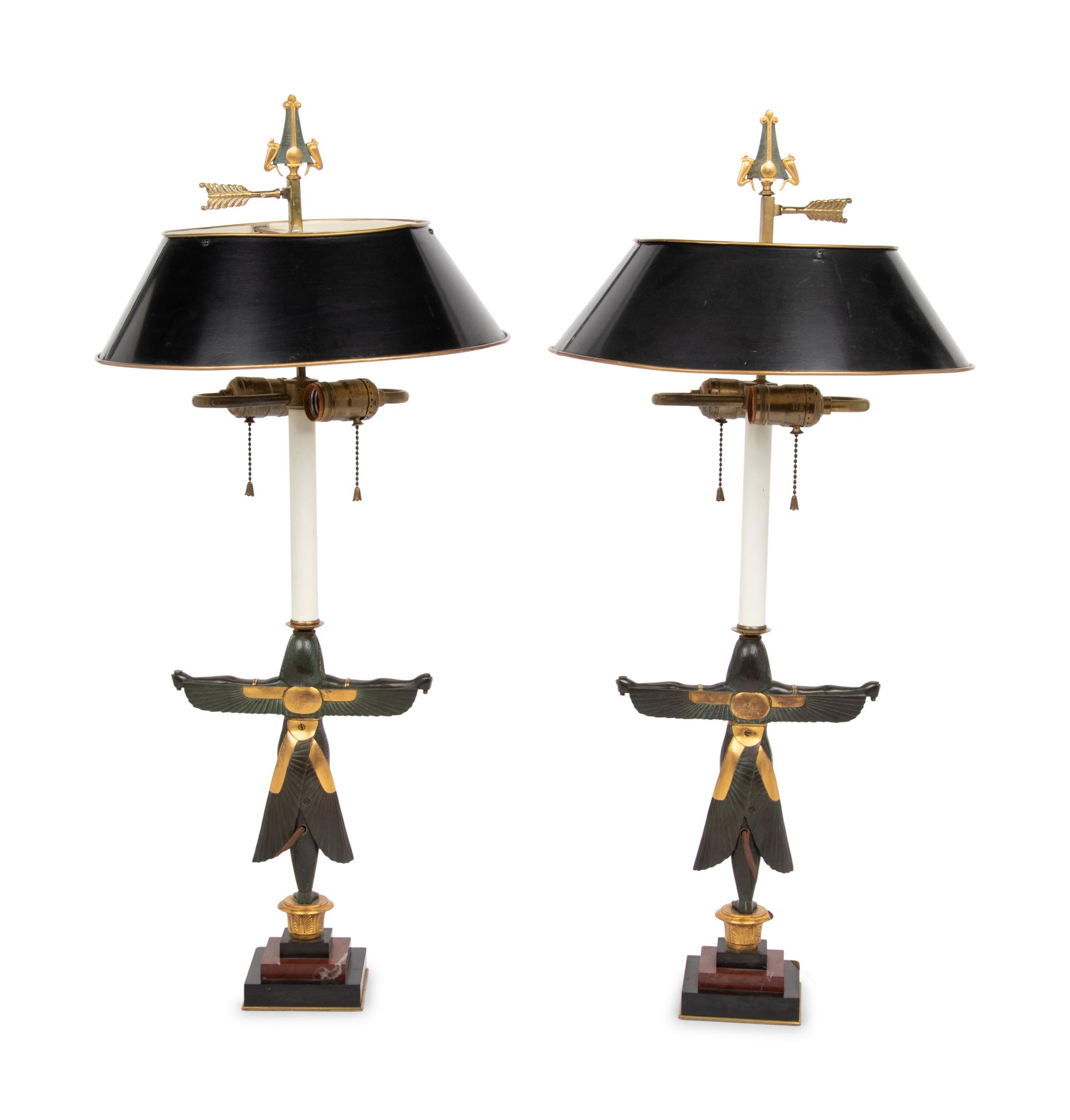 A Pair of Egyptian Revival Parcel Gilt Bronze Figures Mounted as Lamps with Tole Shades