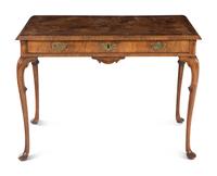 A George II Style Walnut Writing Table with an Associated Armchair