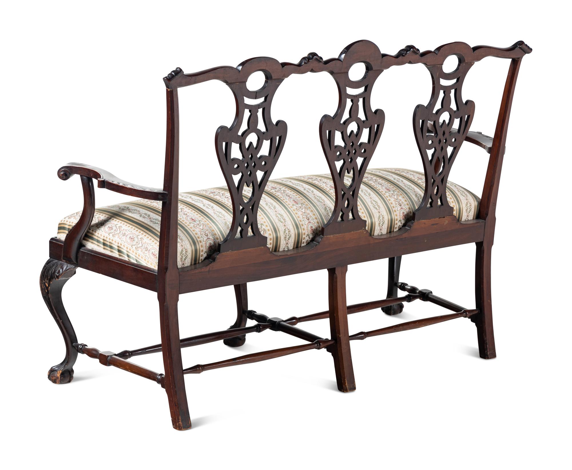 A George III Style Carved Mahogany Settee